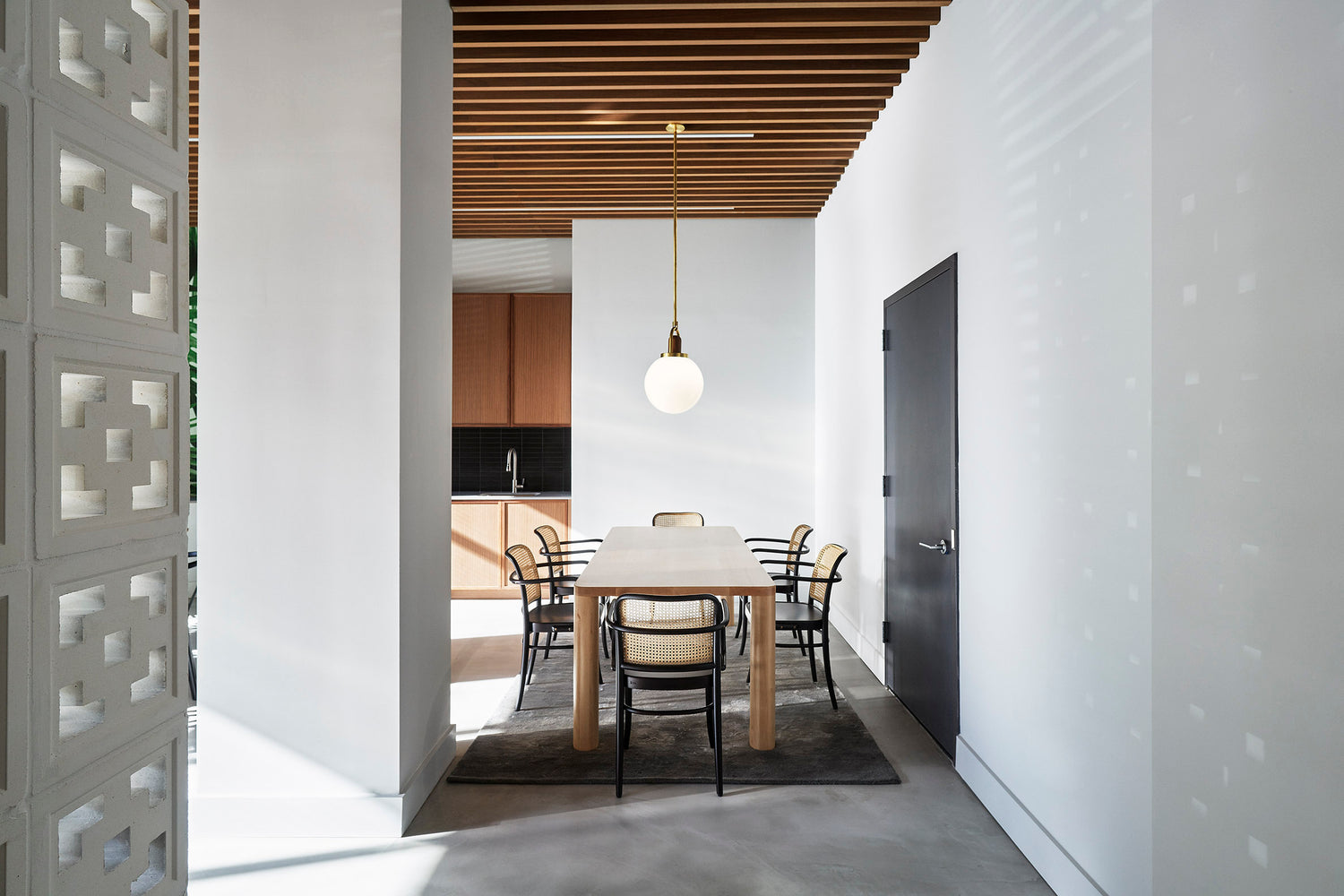 Interior: Mesarch Studio.  Photo: Joseph Shubin || Column Dining Table Corner Leg