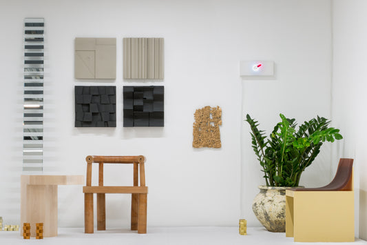 Special Editions Show at Minnesota Street Project gallery.  Curator: Geremia Design || Stacked Leather Chair in a gallery