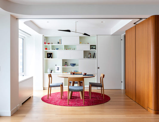 Interior: Pulltab Design.  Photo: Fran Parente || Round Column Angled Leg Dining Table in White Oak