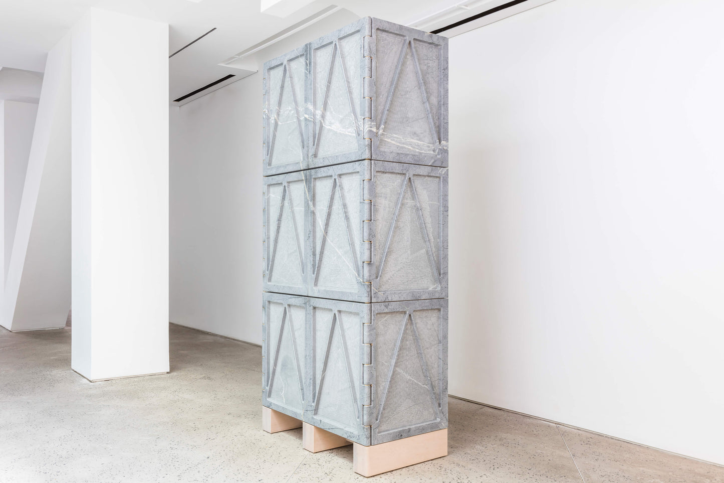 Photo: Chamber Projects || Six Door Relief Stone Cabinets