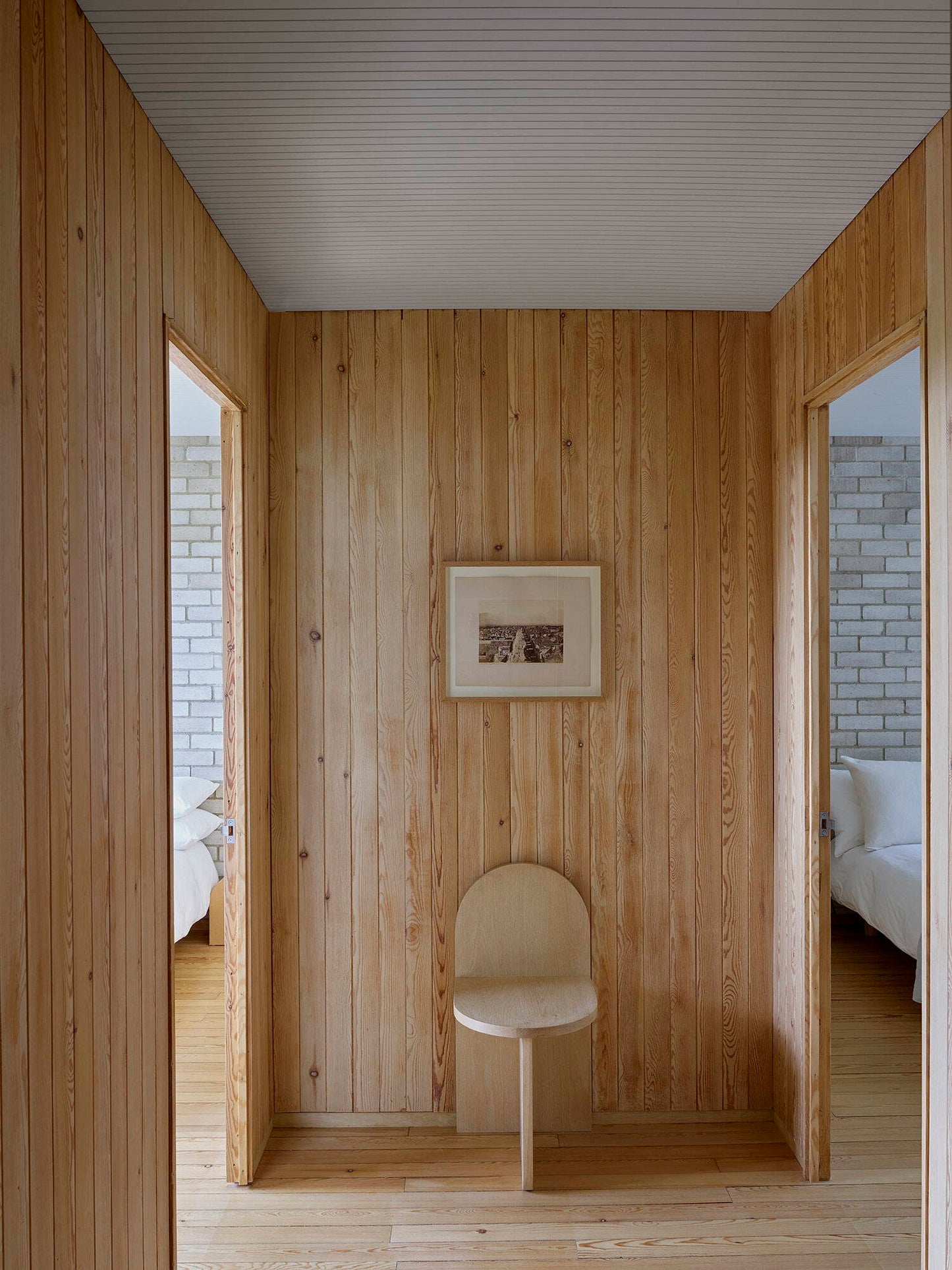 Interior: Toogood.  Photo: Henry Bourne || Wood Tombstone Chair in a hallway
